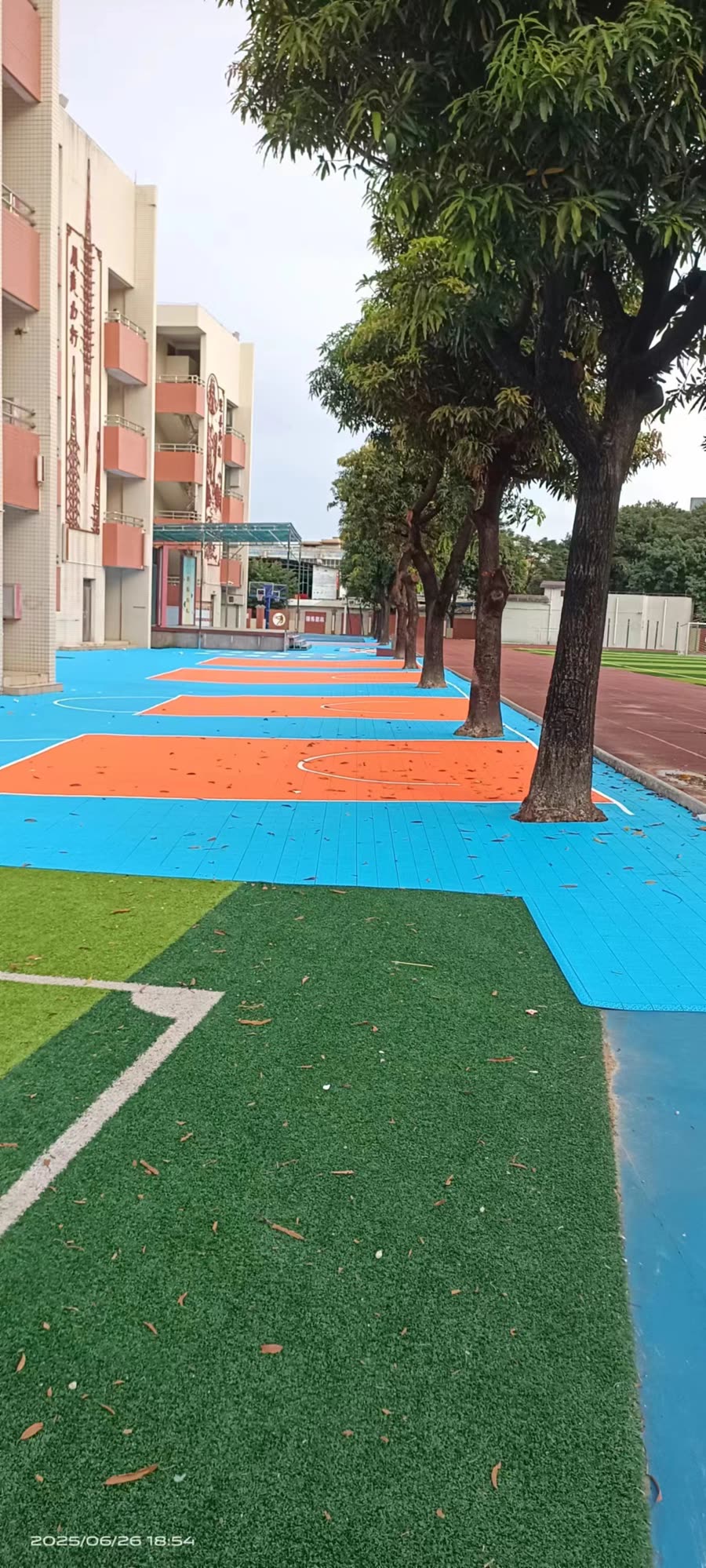 广州育才学校运动场地整体建设拼装运动地板工程案例